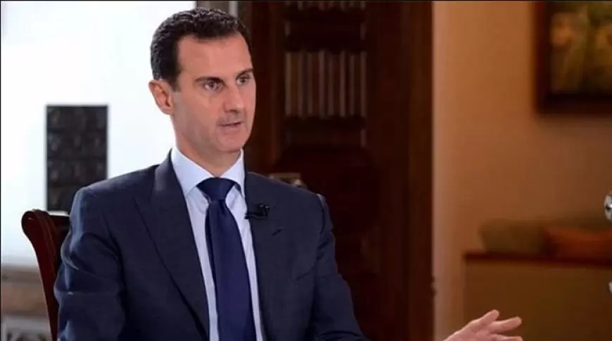 Turkey FM says Assad 'probably outside of Syria'